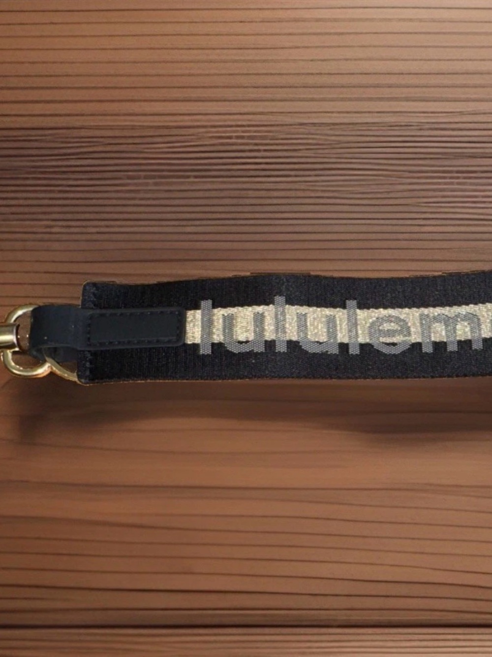 lululemon athletica Black and Gold Logo Key Strap
